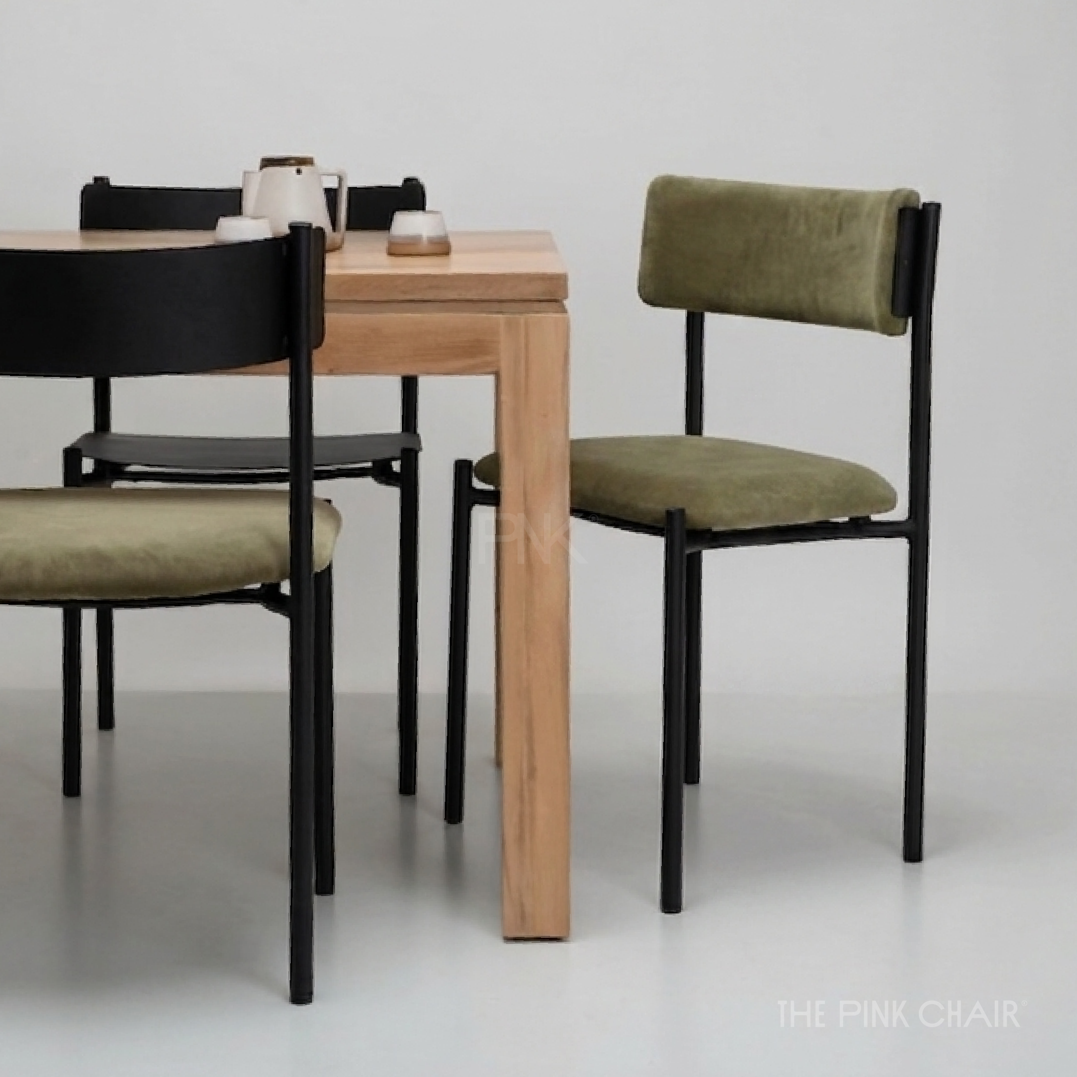 silla-mm01-tapizado-anabella-verde-cano-negro.webp